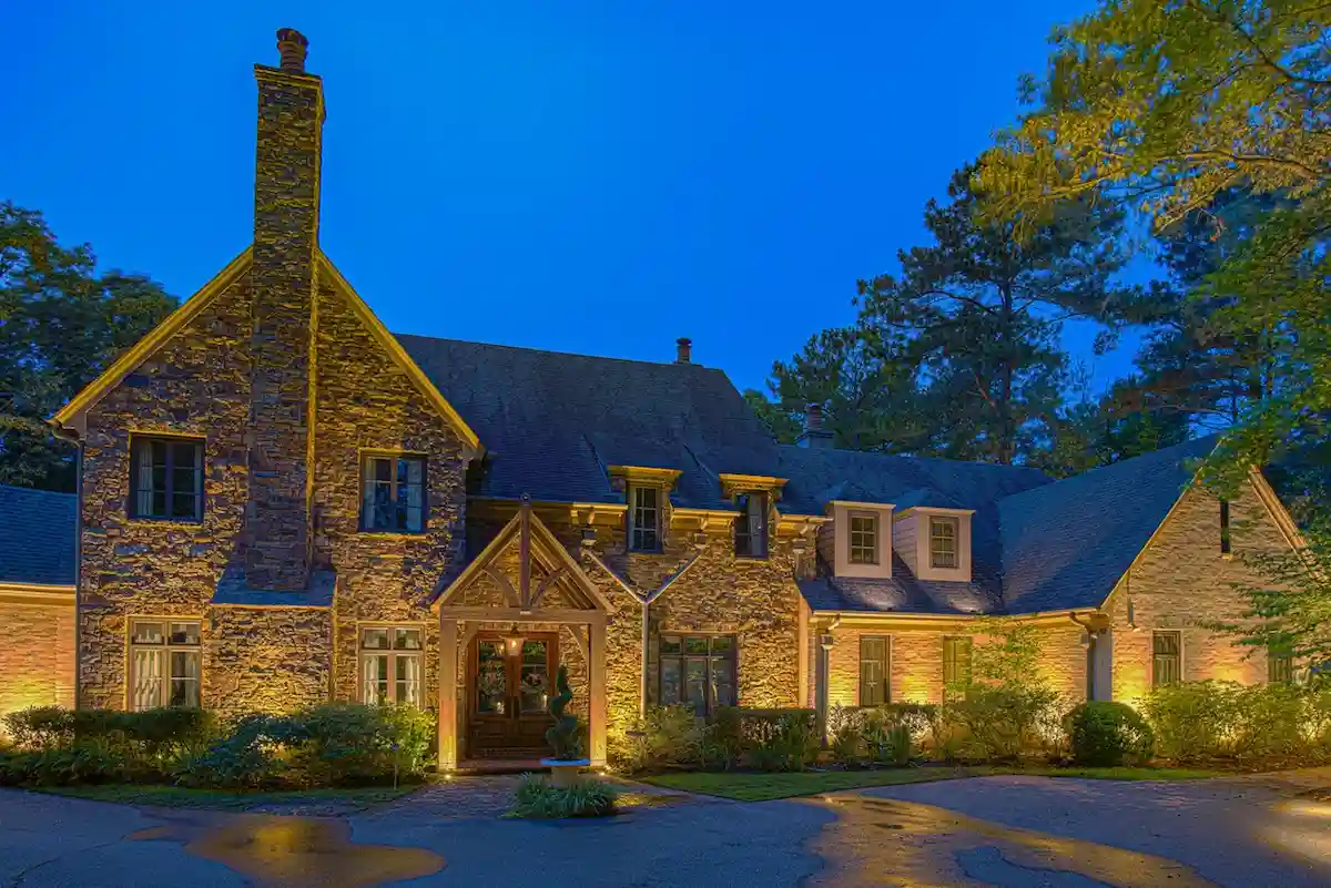 Front-of-home landscape lighting installation in Lexington, KY by Evening Glow LLC